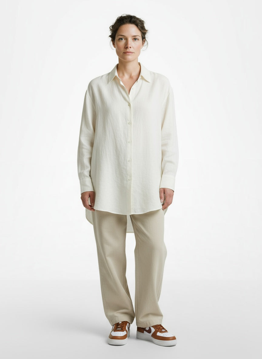 Standing front view of the model wearing Nike Wmns Air Force 1 '07 IM6364-200